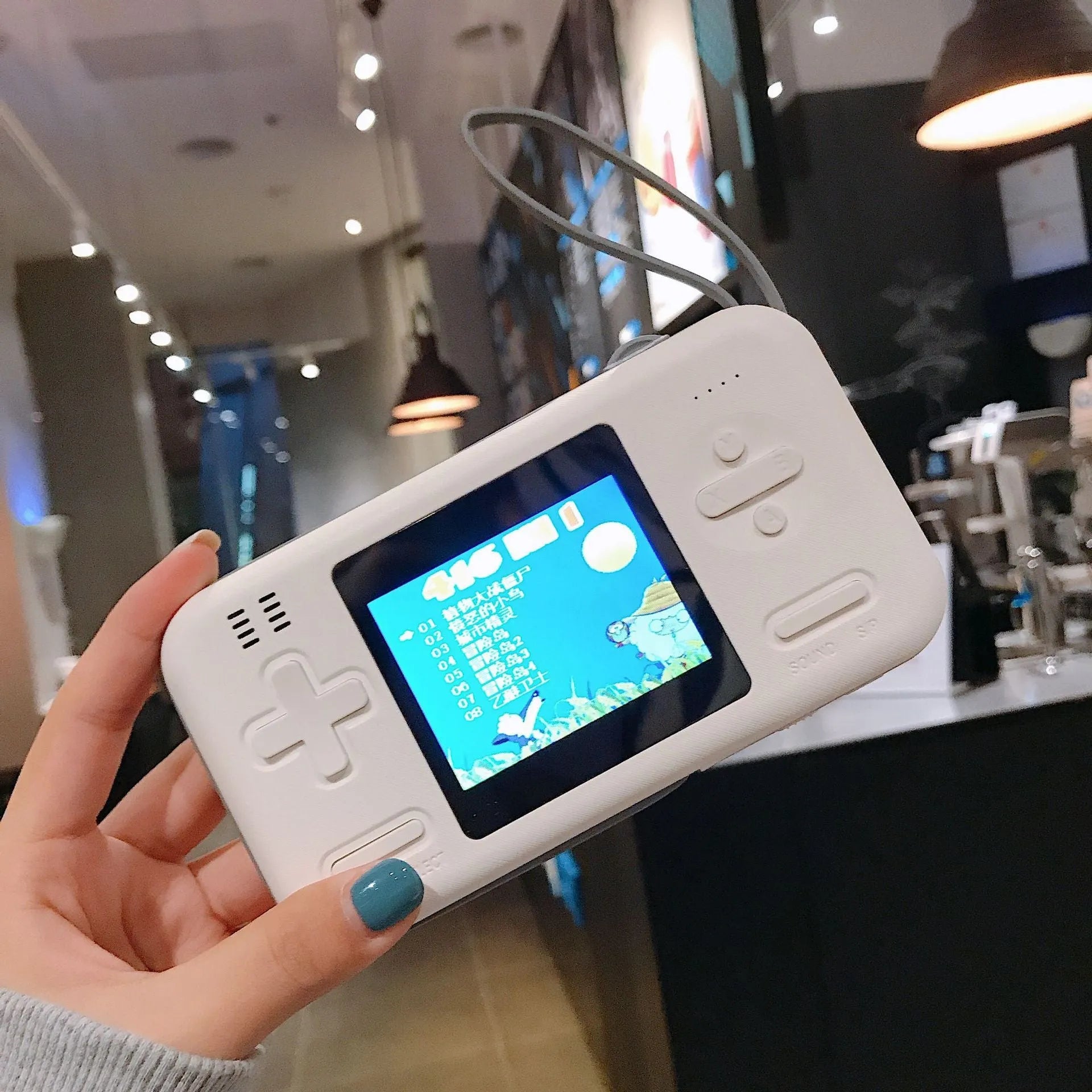 hand-held gaming device - Enfance-Heureuse