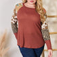 Hailey & Co Full Size Leopard Waffle-Knit Blouse