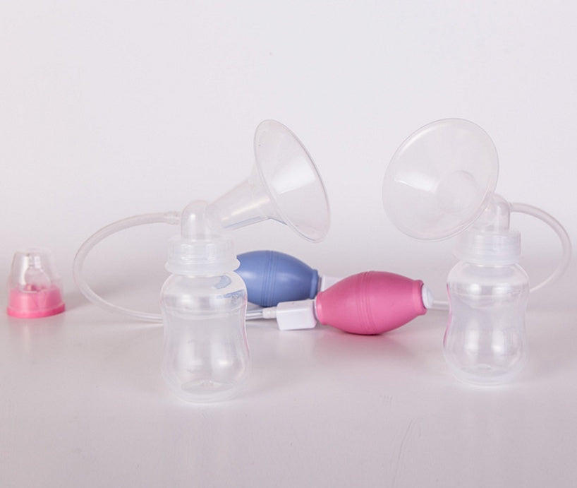 Women Feeding Manual Breast - Enfance-Heureuse